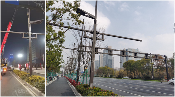Китай Bespoke освещая фонарный столб улицы столбцов стальной с оружиями для установки камеры поставщик